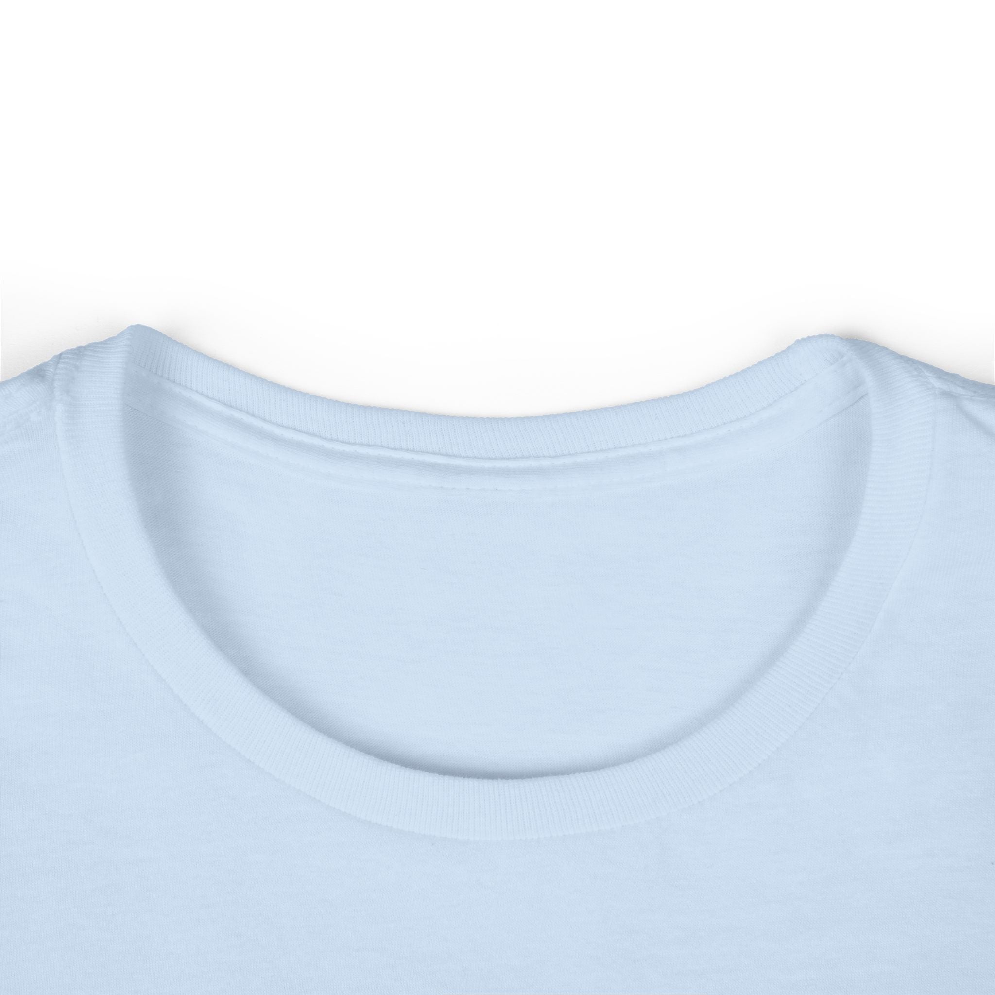 Close-up of a light blue t-shirt with a plain background