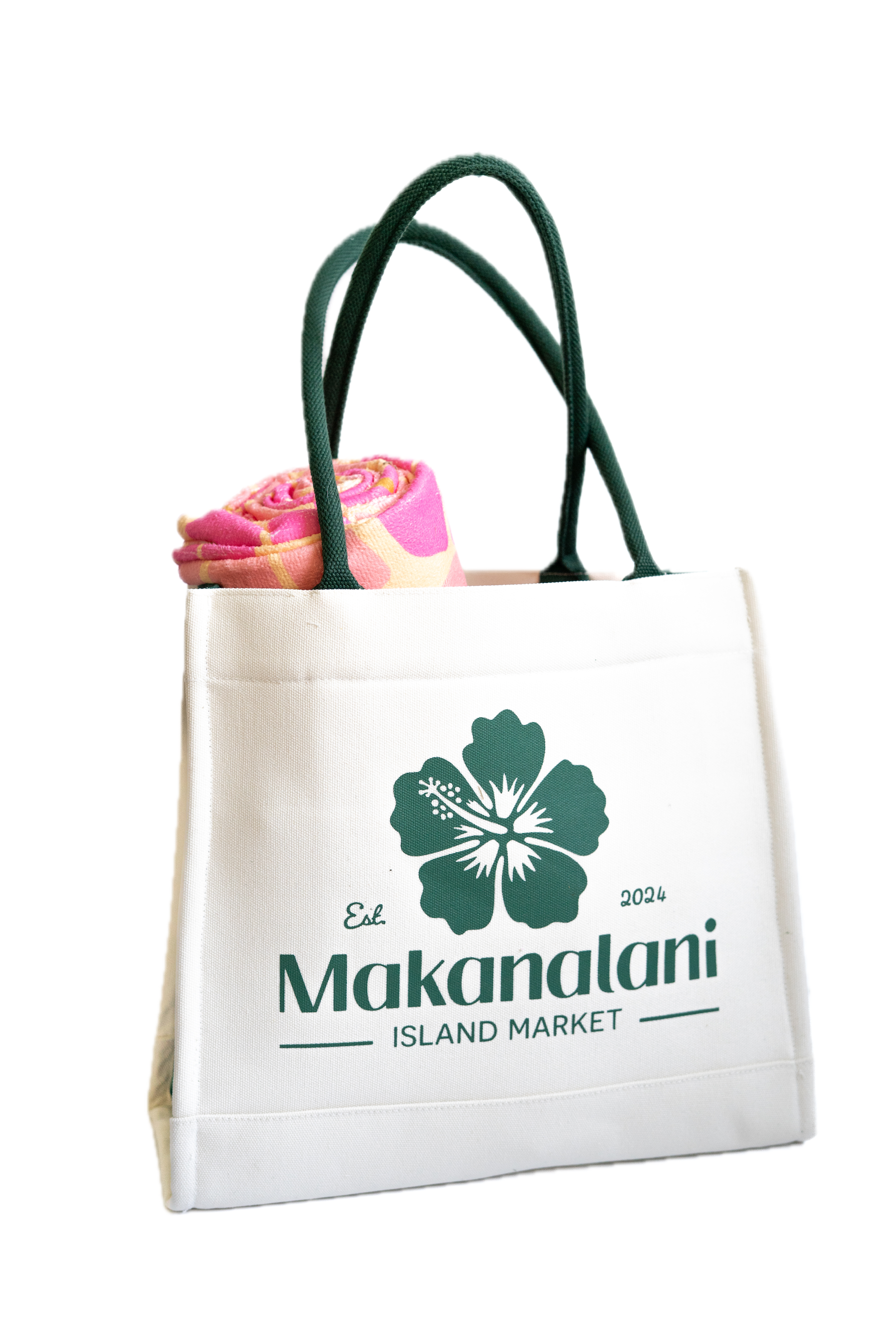 White tote bag with green handles featuring Makanalani Island Market logo on a white background