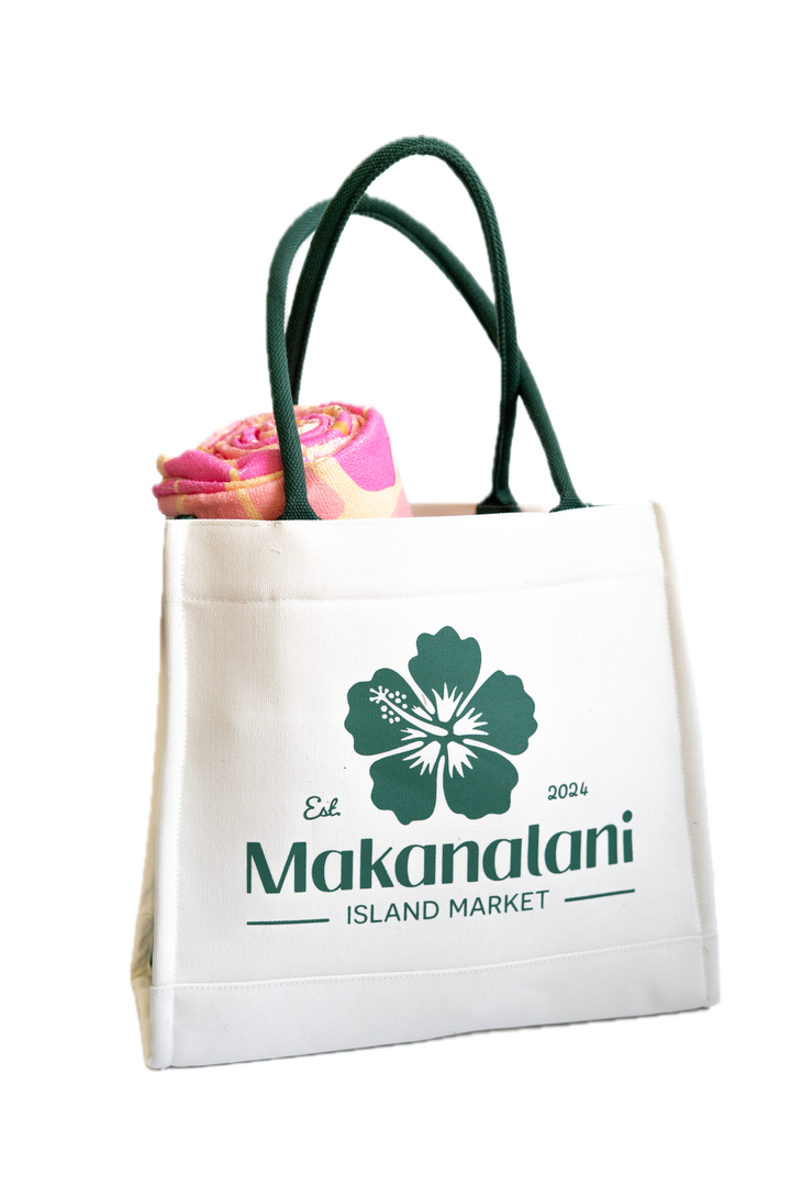 White tote bag with green handles featuring Makanalani Island Market logo on a white background