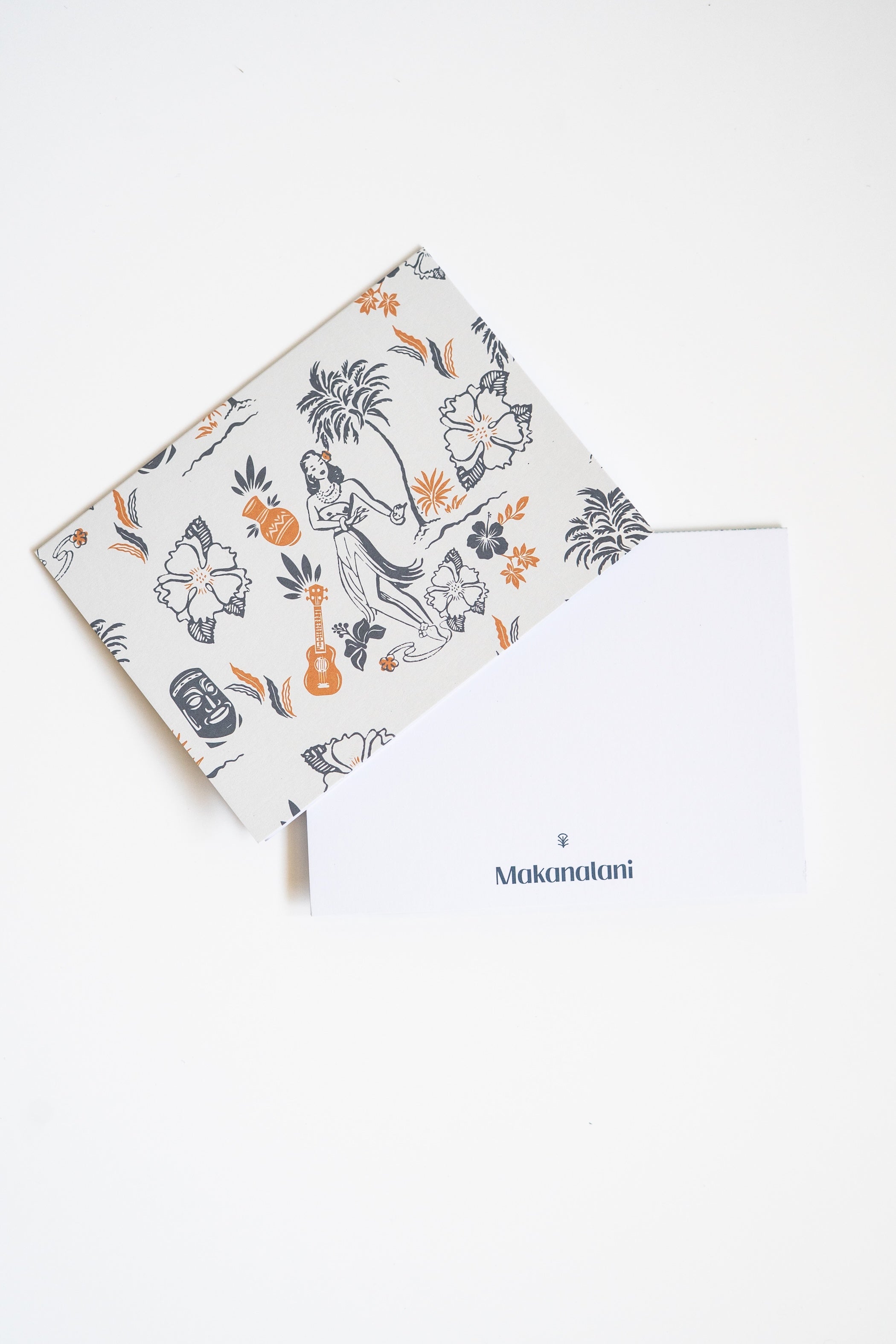 Patterned Makanalani notecard with multi-colored illustrations on a white background