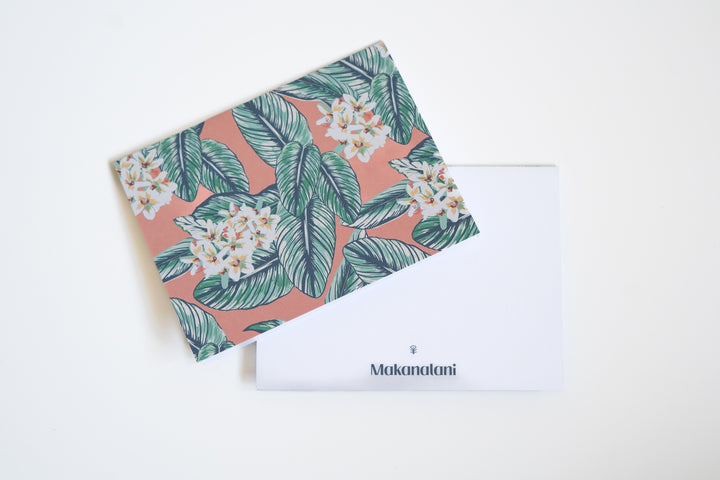 Multi-colored notecard by Makanalani with palm leaves and white flowers
