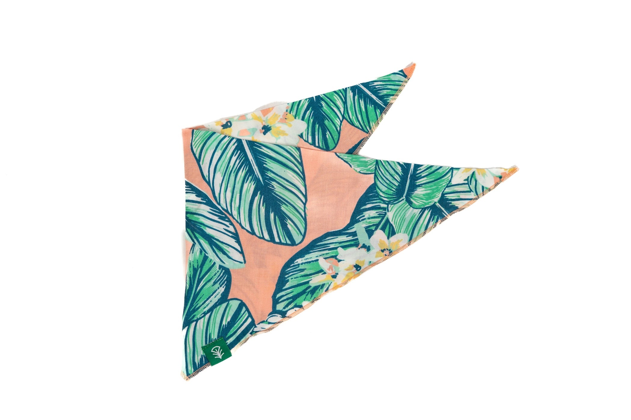 Dog bandana with a tropical leaf print on a white background