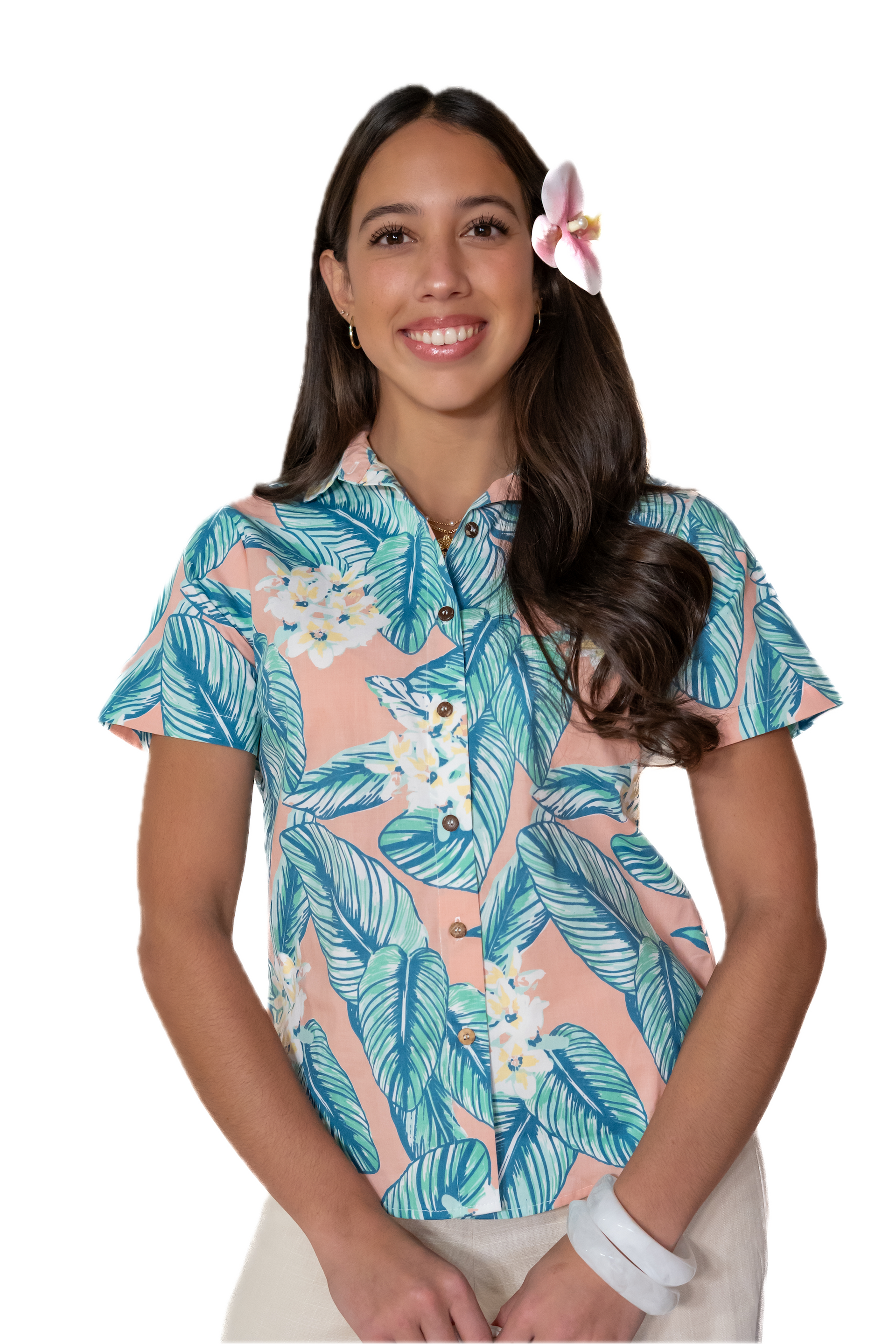 Woman wearing a colorful floral shirt with a white background